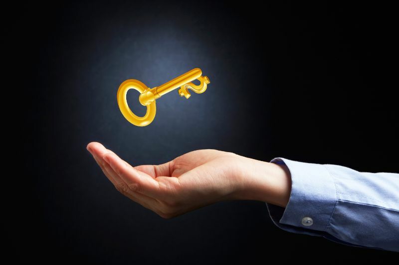 Midnight Locksmiths & Security | 24 Hour Emergency Locksmith West Ryde, Sydney Image of hand & key representing Midnight Locksmiths & Security 24 Hour Emergency Locksmith